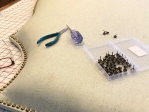 how to remove upholstery tacks with pliers