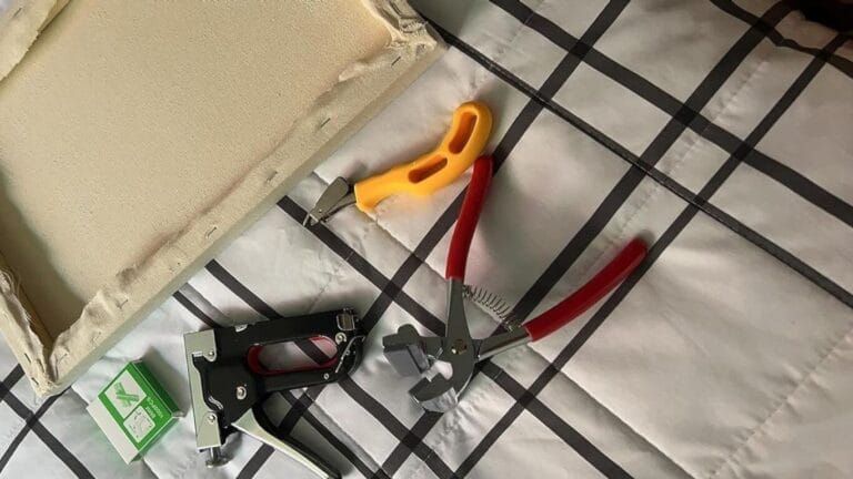 canvas stretching pliers in use